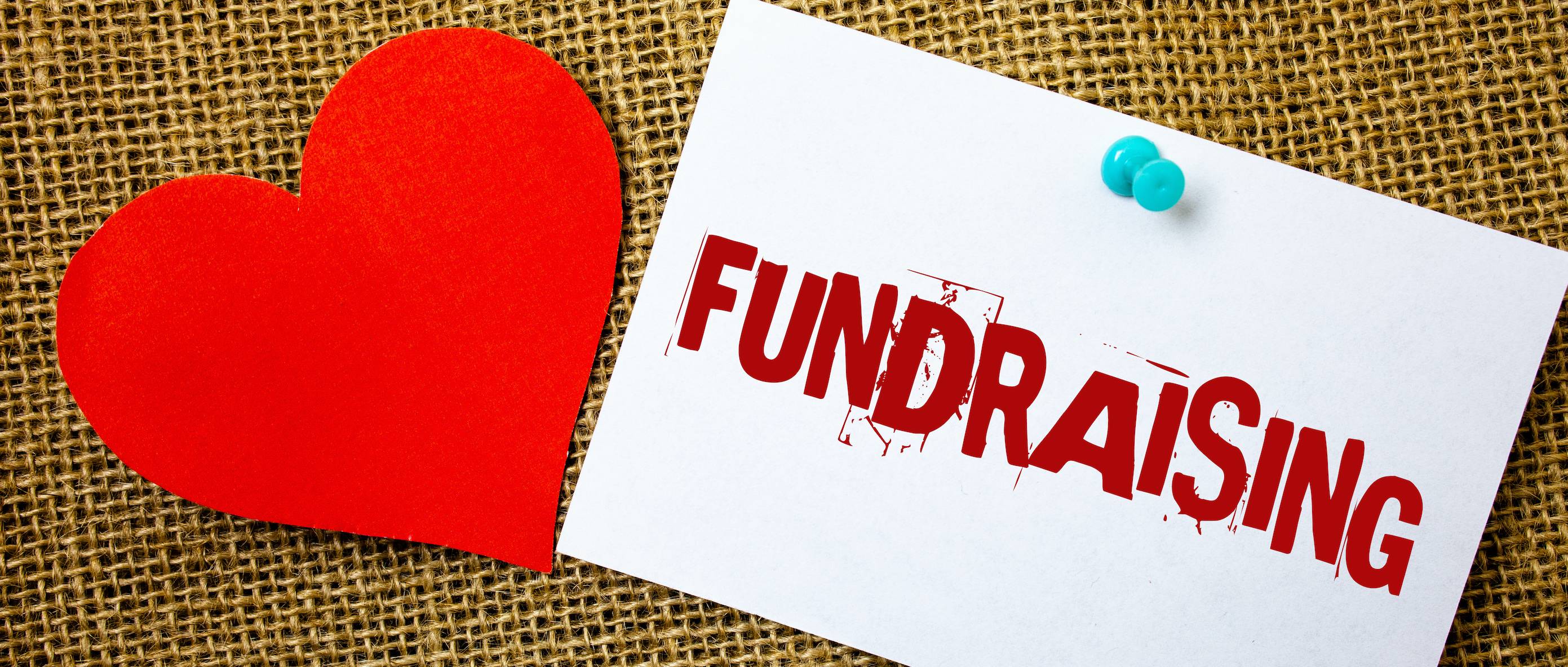 Paper heart next to the word Fundraising