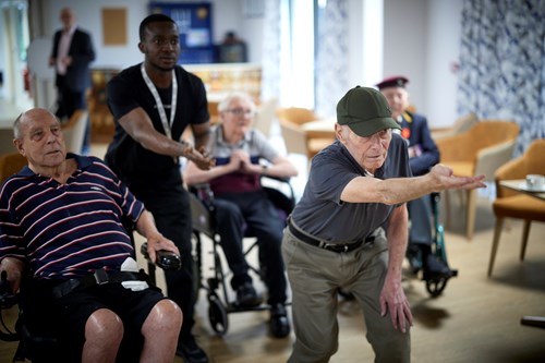 Veterans at Broughton House playing virtual bowling